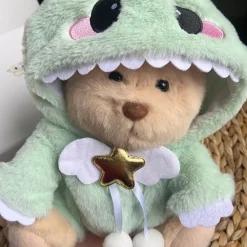 Nino – L’ours en peluche articulé fait main avec son déguisement de dinosaure – Ourson à habiller