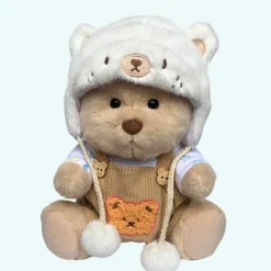 Nino – L’ours en peluche articulé fait main avec pull tricoté et salopette marron