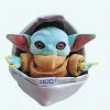 Peluche Baby Yoda dans son berceau