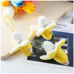 Peluche banane jaune épluchée