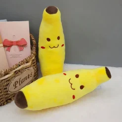 Peluche banane souriante