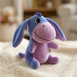 Peluche Bourriquet aimantée épaule
