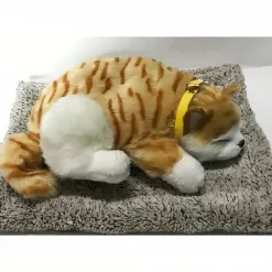 Peluche chat orange tigré endormi