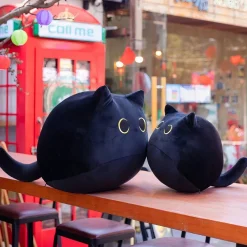 Peluche chaton noir aux grands yeux