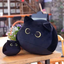 Peluche chaton noir aux grands yeux