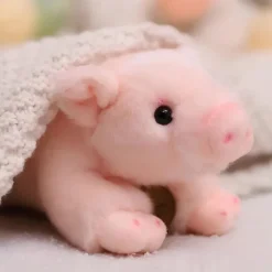 Peluche cochon allongé adorable