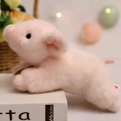Peluche cochon allongé adorable