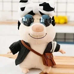 Peluche cochon habillé avec noeud vache
