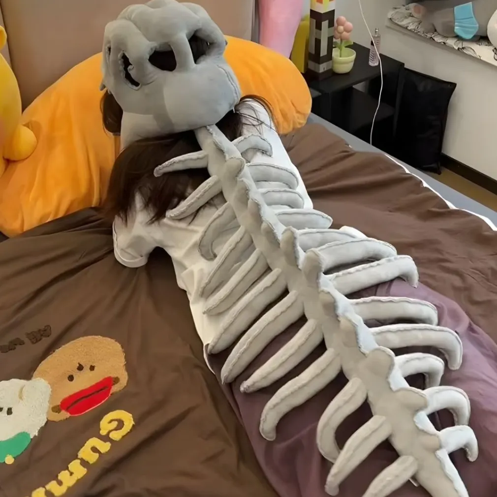 Peluche déguisement squelette de dinosaure