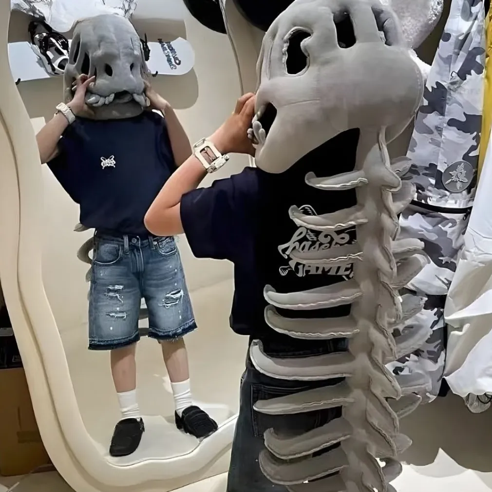 Peluche déguisement squelette de dinosaure