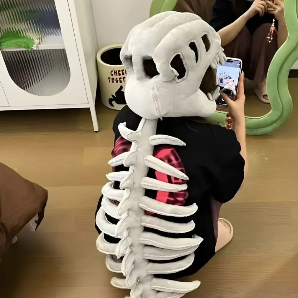 Peluche déguisement squelette de dinosaure
