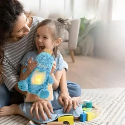 Peluche dinosaure mignon qui respire avec berceuse apaisante