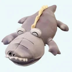 Peluche dinosaure violet magique
