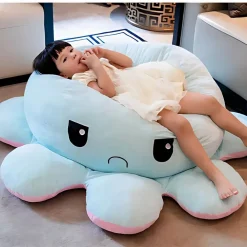 Peluche géante pieuvre réversible visage content et pas content