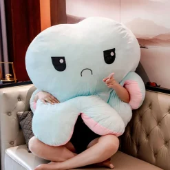 Peluche géante pieuvre réversible visage content et pas content