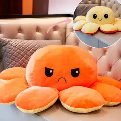Peluche géante pieuvre réversible visage content et pas content