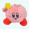 Peluche Kirby qui tient une étoile