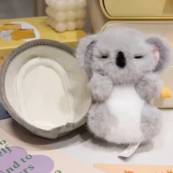 Peluche koala avec nid douillet