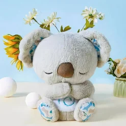 Peluche koala qui respire avec berceuse apaisante