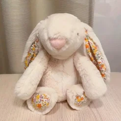 Peluche lapin avec oreilles fleuries