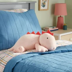 Peluche lestée dinosaure rose