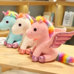 Peluche licorne avec ailes scintillantes