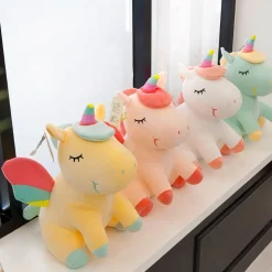 Peluche licorne jaune arc-en-ciel