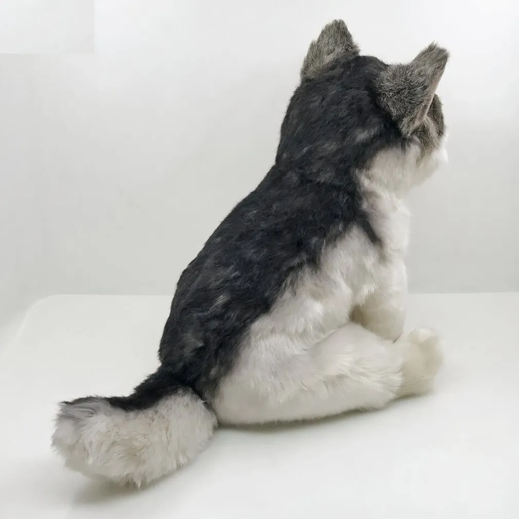 Peluche loup assis