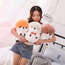 Peluche loutre en tablier