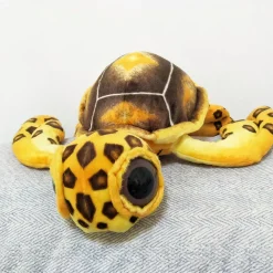 Peluche oreiller tortue à grands yeux