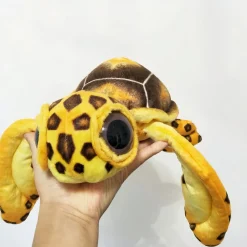 Peluche oreiller tortue à grands yeux