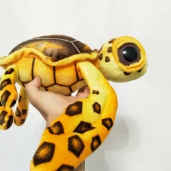 Peluche oreiller tortue à grands yeux