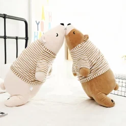Peluche ours marron habillé qui dort