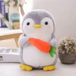 Peluche pingouin carotte