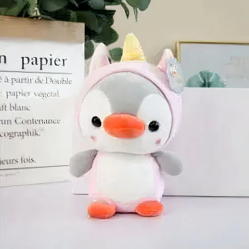 Peluche pingouin déguisé en licorne