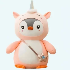 Peluche pingouin déguisé licorne rose