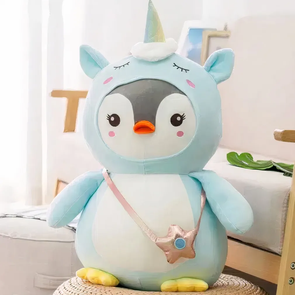 Peluche pingouin déguisé licorne bleue