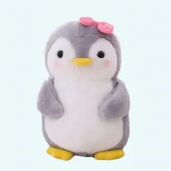 Peluche pingouin nœud rose