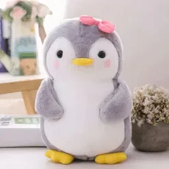 Peluche pingouin nœud rose