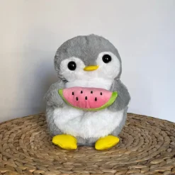 Peluche pingouin qui respire avec berceuses intégrées