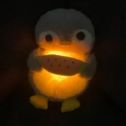 Peluche pingouin qui respire avec berceuses intégrées