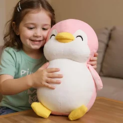 Peluche pingouin rose souriant