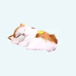 Peluche poupée chat roux et blanc qui dort