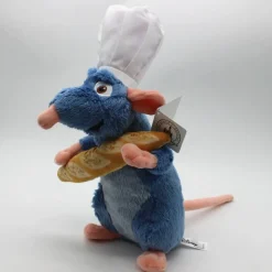 Peluche Ratatouille avec une baguette de pain