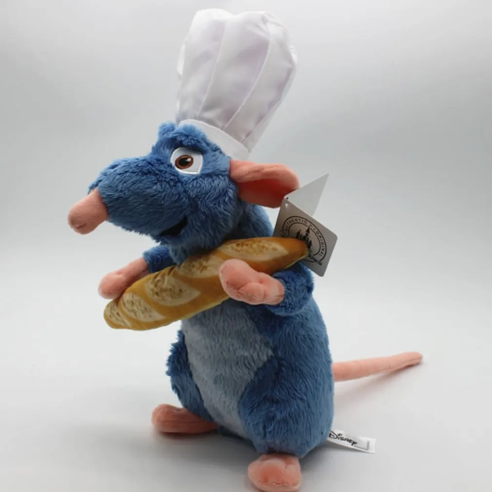 Peluche Ratatouille avec une baguette de pain