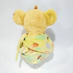 Peluche Simba dans une petite couverture
