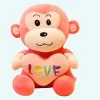 Peluche singe avec cœur