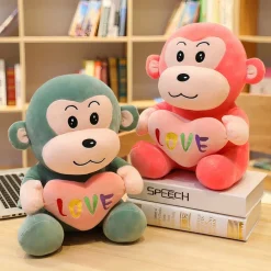 Peluche singe avec cœur