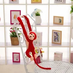 Peluche singe kawaii longue queue rouge