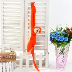 Peluche singe kawaii longue queue orange